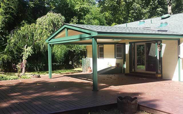 replacement trex deck porch with new skylights on house