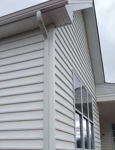 newly replaced vinyl siding on residential house