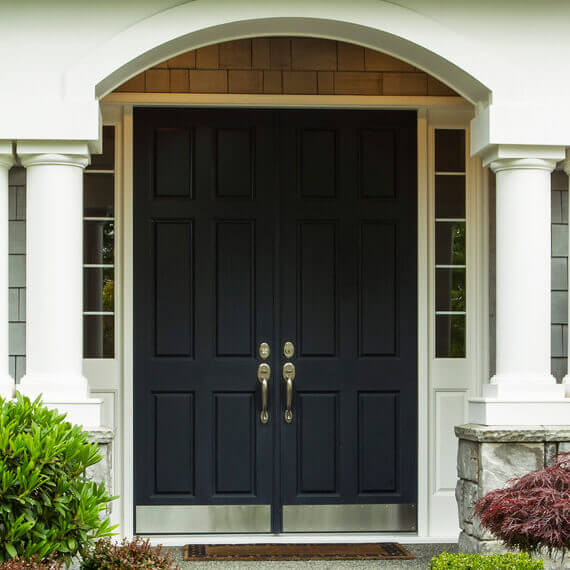 dark exterior doors with nickel accessories at front entry way